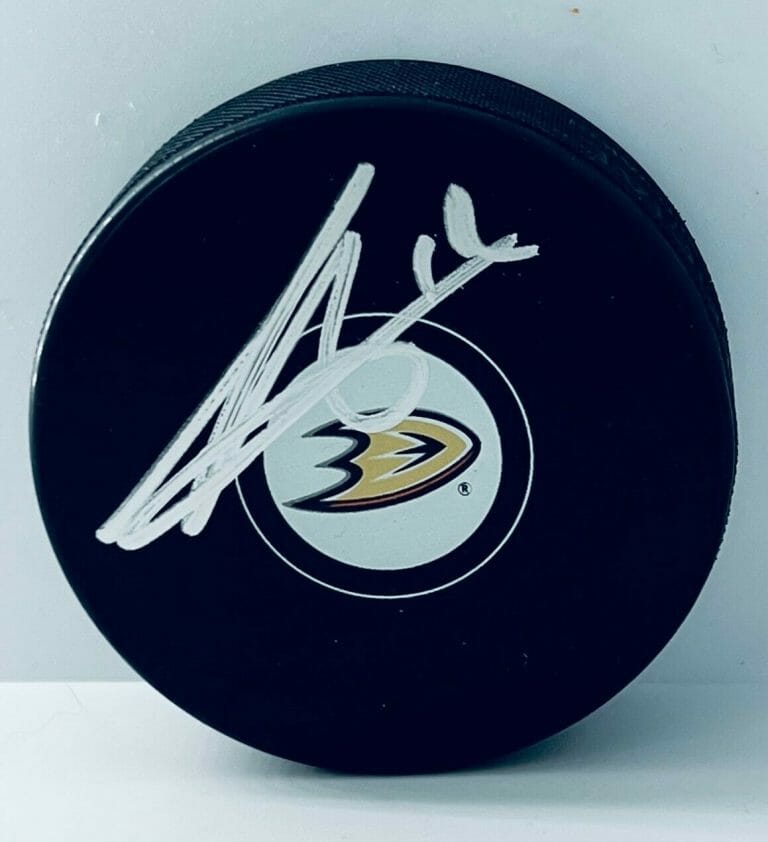 SONNY MILANO SIGNED ANAHEIM DUCKS PUCK AUTOGRAPHED COLLECTIBLE MEMORABILIA