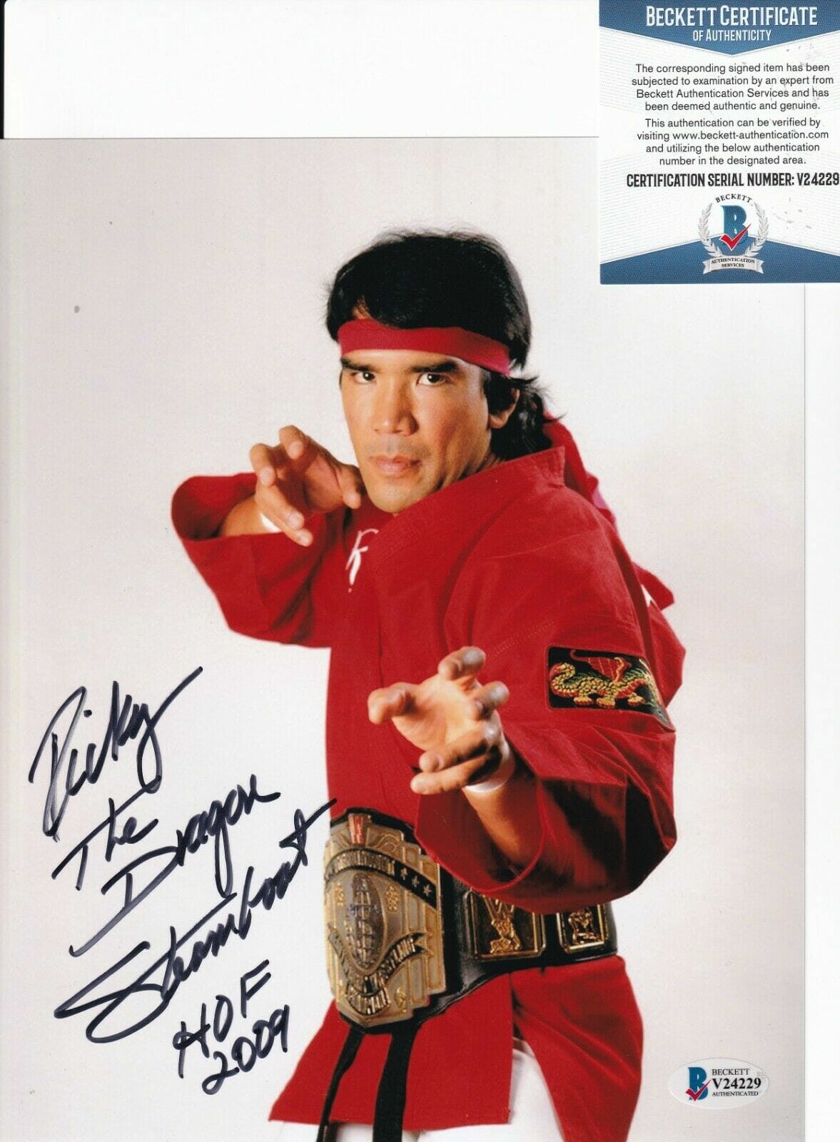 RICKY "THE DRAGON* STEAMBOAT signed WRESTLING WWF 8X10 photo BECKETT