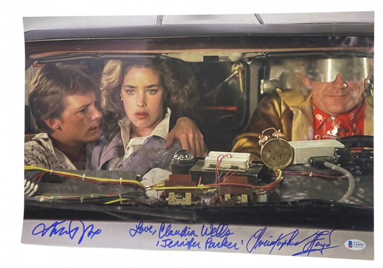 MICHAEL J FOX CHRISTOPHER LLOYD CLAUDIA WELLS SIGNED BTTF 12X18 PHOTO BECKETT
 COLLECTIBLE MEMORABILIA