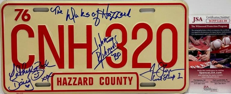 SCHNEIDER WOPAT BACH SIGNED AUTOGRAPH METAL LICENSE PLATE THE DUKES HAZZARD JSA
 COLLECTIBLE MEMORABILIA