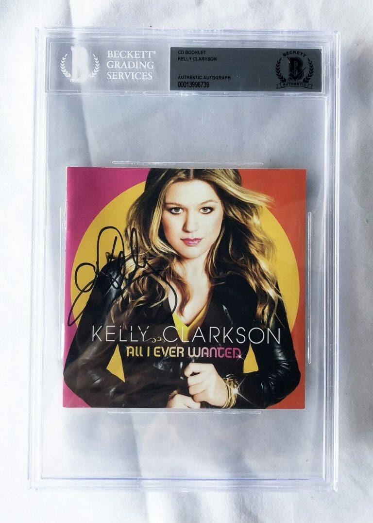 KELLY CLARKSON SIGNED CD COVER BECKETT BAS 1 COA COLLECTIBLE MEMORABILIA