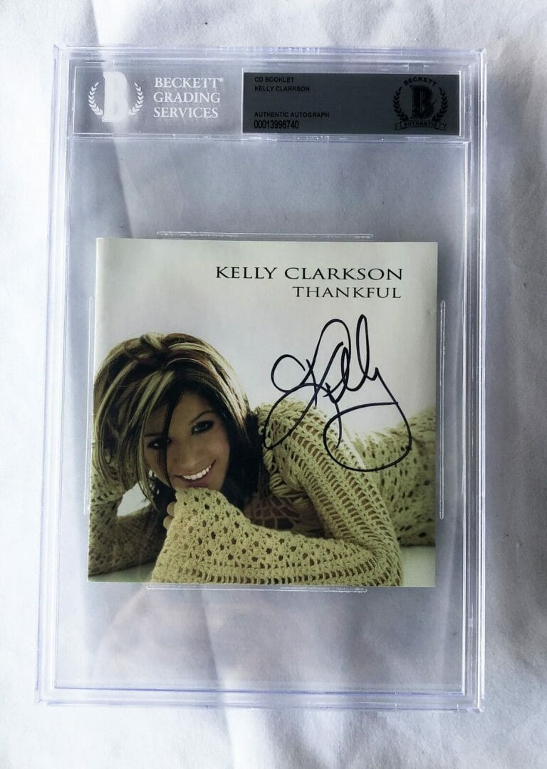 KELLY CLARKSON SIGNED CD COVER BECKETT BAS 2 COA COLLECTIBLE MEMORABILIA
