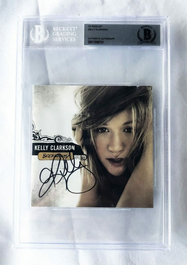 KELLY CLARKSON SIGNED CD COVER BECKETT BAS COA COLLECTIBLE MEMORABILIA