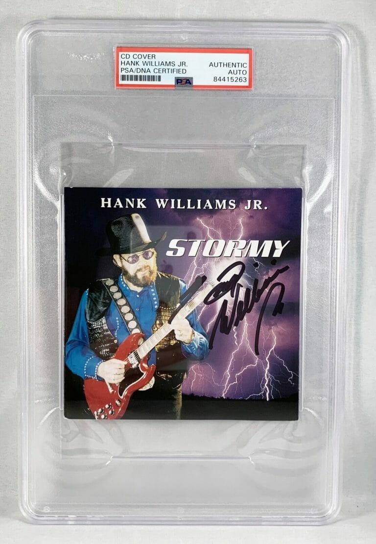 COUNTRY SINGER HANK WILLIAMS JR SIGNED CD COVER PSA/DNA 5 COA COLLECTIBLE MEMORABILIA