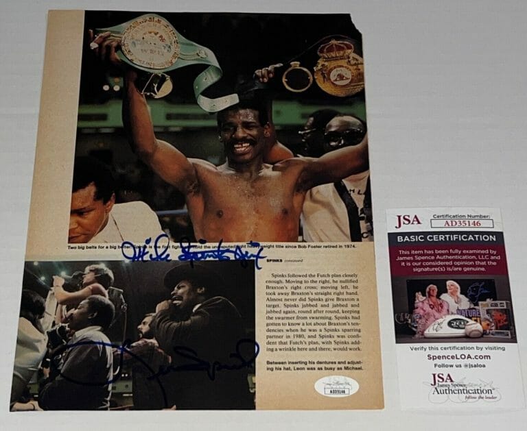 LEON SPINKS & MICHAEL SPINKS SIGNED BOXING MAGAZINE PAGE AUTOGRAPHED JSA COLLECTIBLE MEMORABILIA