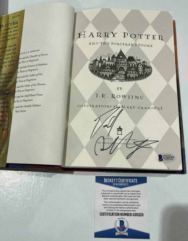 DANIEL RADCLIFFE SIGNED HARRY POTTER AND THE SORCERER’S STONE BOOK BECKETT 181 COLLECTIBLE MEMORABILIA