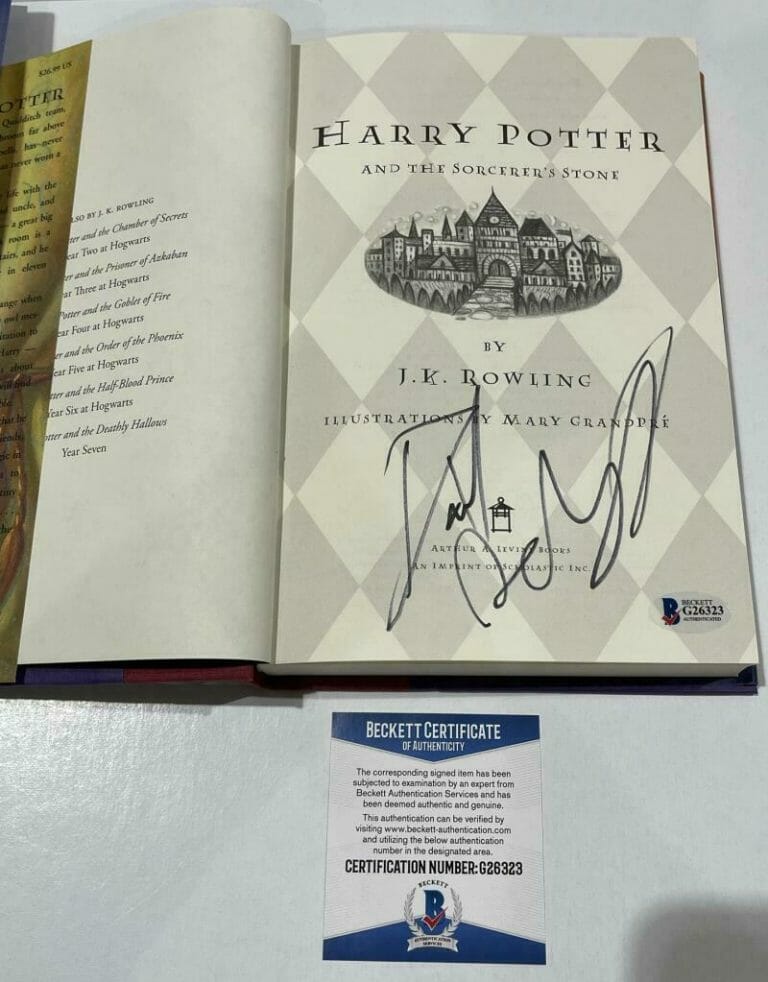 DANIEL RADCLIFFE SIGNED HARRY POTTER AND THE SORCERER’S STONE BOOK BECKETT 176 COLLECTIBLE MEMORABILIA