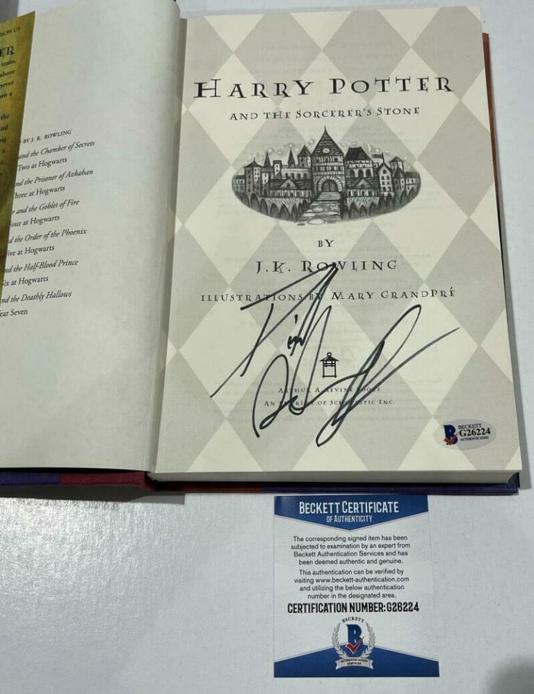 http://autographia-uploads.s3.us-east-2.amazonaws.com/wp-content/uploads/2022/07/25171843/daniel-radcliffe-signed-harry-potter-and-the-sorcerer-8217-s-stone-book-beckett-162-collectible-memorabilia-175151401444-768x998.jpeg