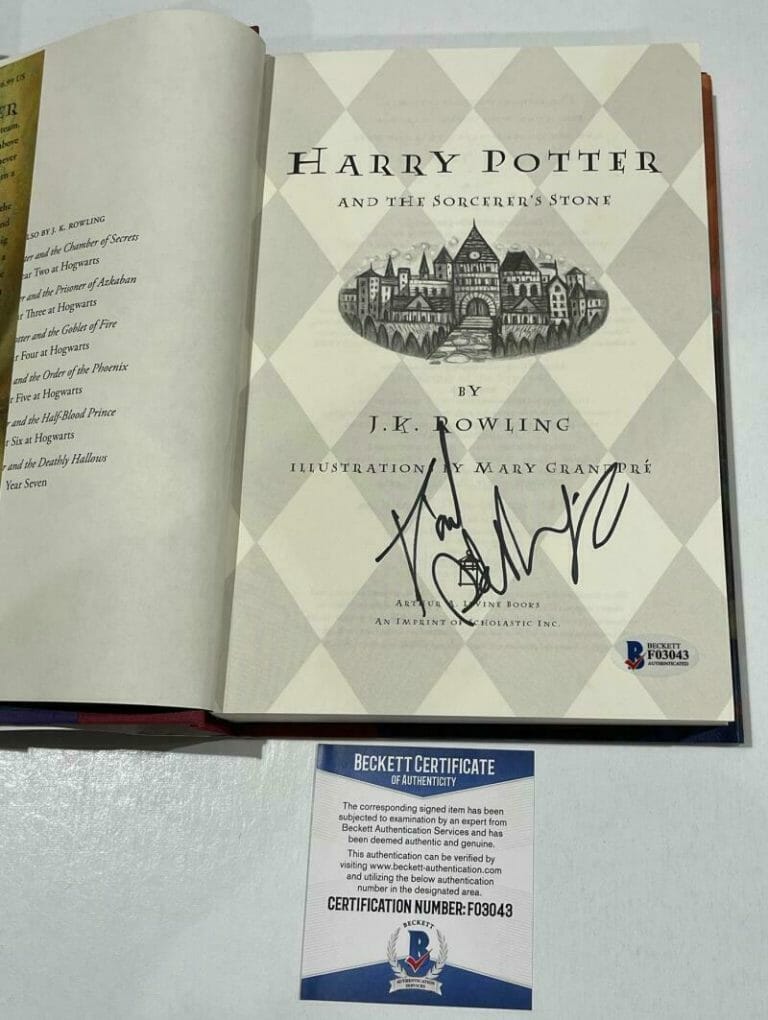 DANIEL RADCLIFFE SIGNED HARRY POTTER AND THE SORCERER’S STONE BOOK BECKETT 83 COLLECTIBLE MEMORABILIA