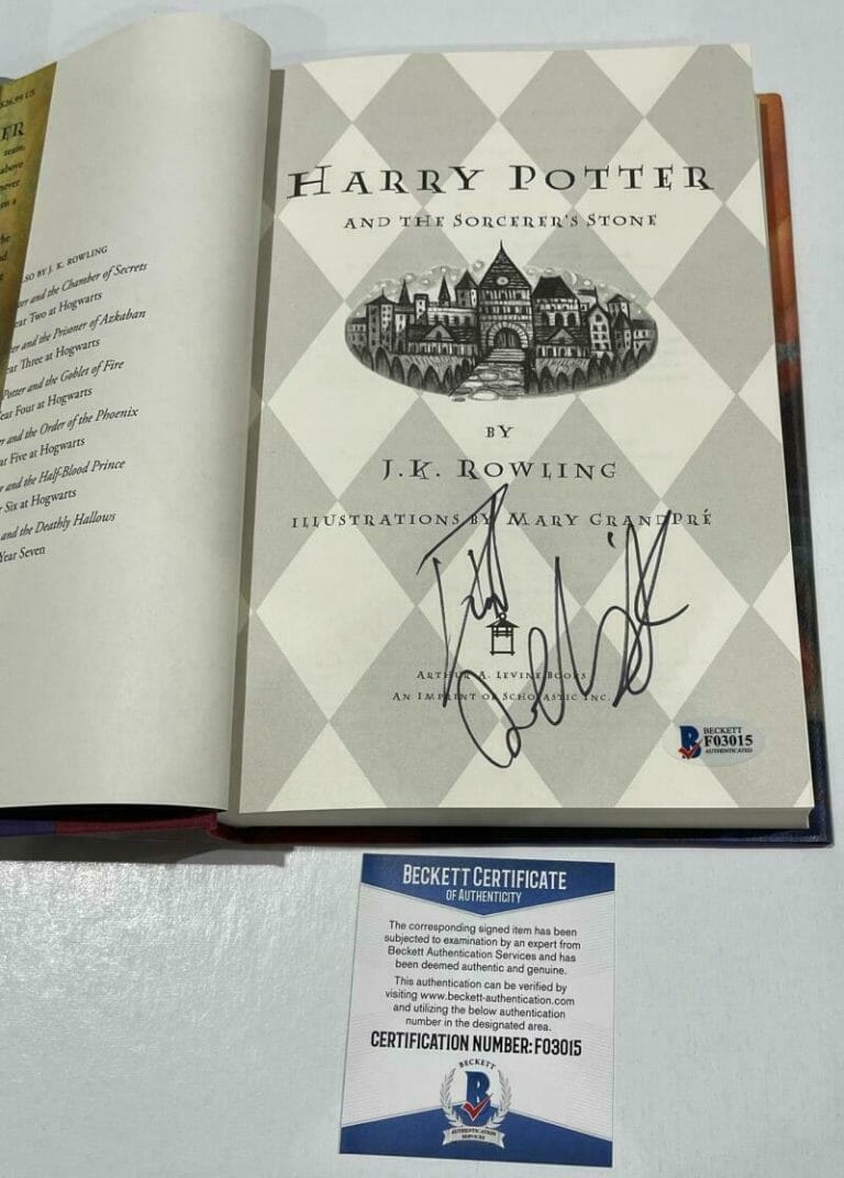 DANIEL RADCLIFFE SIGNED HARRY POTTER AND THE SORCERER’S STONE BOOK BECKETT 92 COLLECTIBLE MEMORABILIA