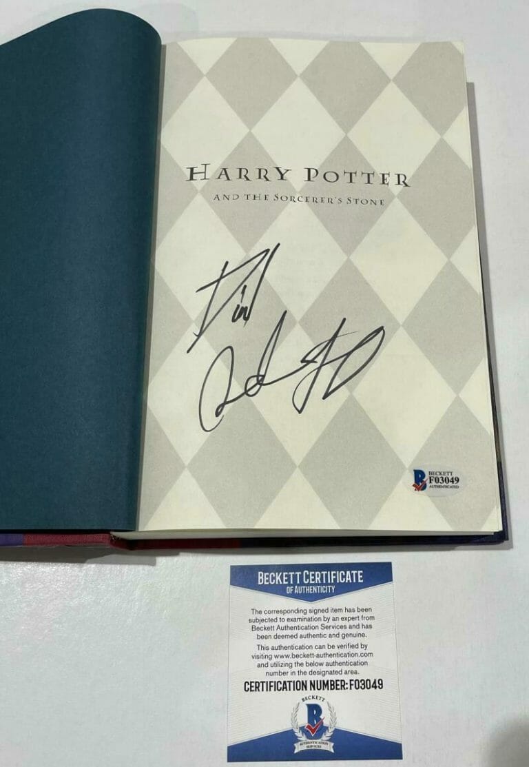 DANIEL RADCLIFFE SIGNED HARRY POTTER AND THE SORCERER’S STONE BOOK BECKETT 116 COLLECTIBLE MEMORABILIA