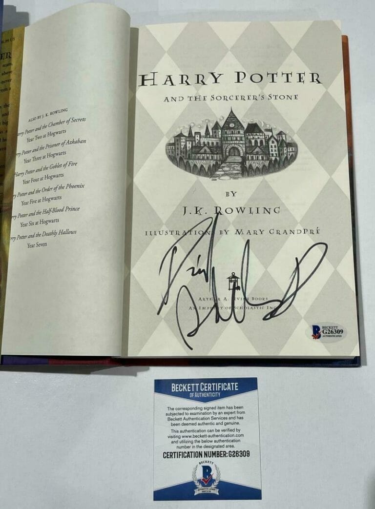 DANIEL RADCLIFFE SIGNED HARRY POTTER AND THE SORCERER’S STONE BOOK BECKETT 76 COLLECTIBLE MEMORABILIA