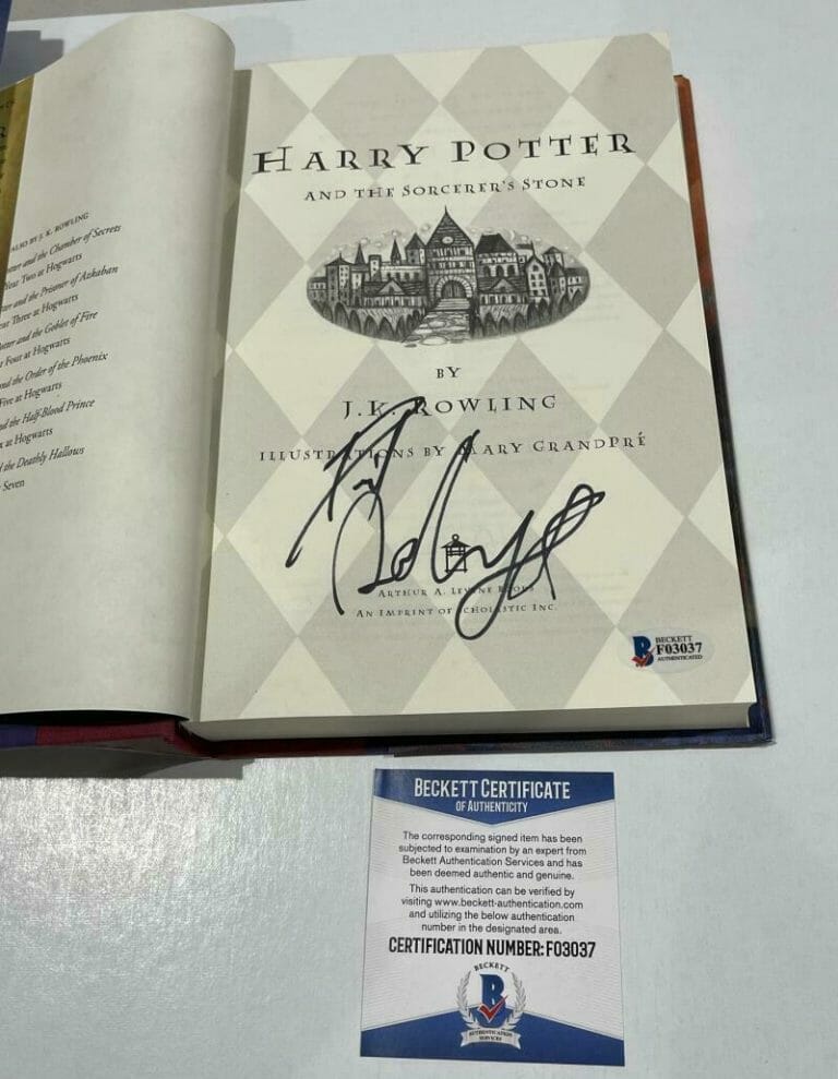 DANIEL RADCLIFFE SIGNED HARRY POTTER AND THE SORCERER’S STONE BOOK BECKETT 105 COLLECTIBLE MEMORABILIA