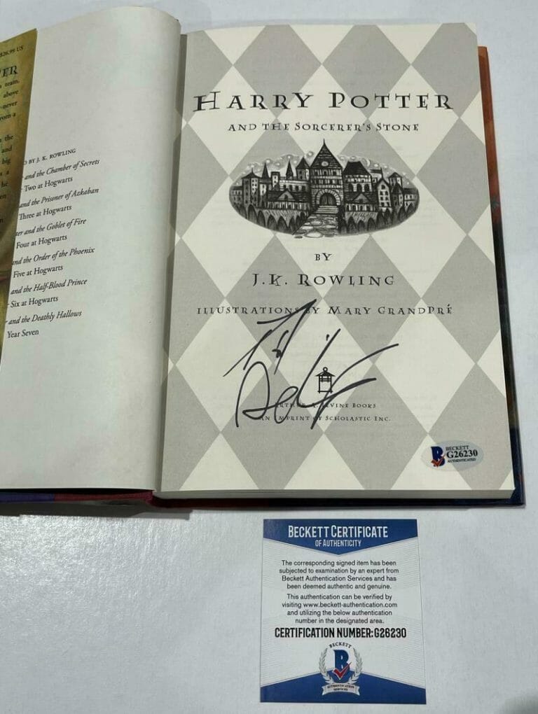 DANIEL RADCLIFFE SIGNED HARRY POTTER AND THE SORCERER’S STONE BOOK BECKETT 144 COLLECTIBLE MEMORABILIA