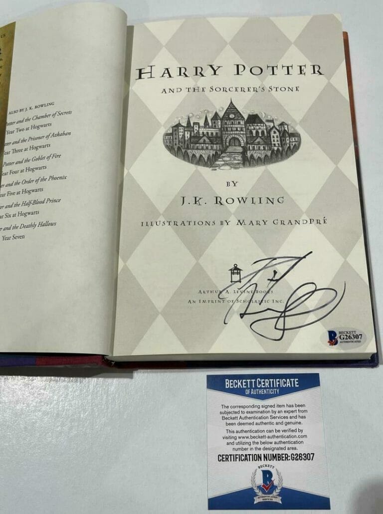 DANIEL RADCLIFFE SIGNED HARRY POTTER AND THE SORCERER’S STONE BOOK BECKETT 147 COLLECTIBLE MEMORABILIA