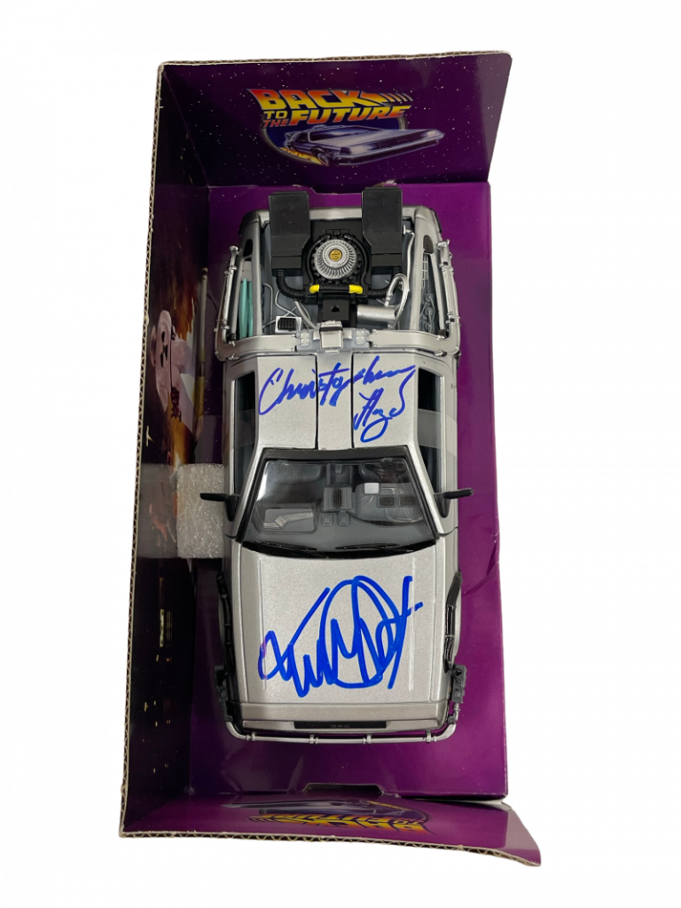 MICHAEL J FOX CHRISTOPHER LLOYD SIGNED BACK TO THE FUTURE 1:24 DELOREAN PSA 7 COLLECTIBLE MEMORABILIA