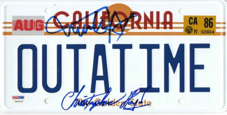 MICHAEL J FOX CHRISTOPHER LLOYD SIGNED BACK TO THE FUTURE LICENSE PLATE PSA 31 COLLECTIBLE MEMORABILIA