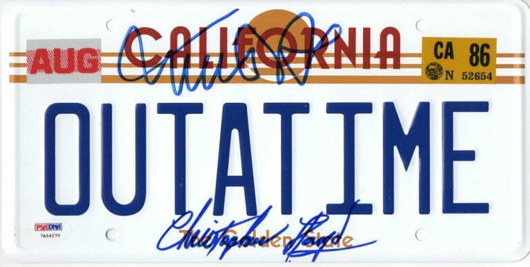 MICHAEL J FOX CHRISTOPHER LLOYD SIGNED BACK TO THE FUTURE LICENSE PLATE PSA 32 COLLECTIBLE MEMORABILIA