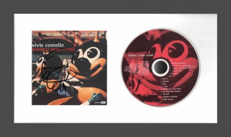 ELVIS COSTELLO SIGNED AUTOGRAPH WHEN I WAS CRUEL FRAMED CD DISPLAY READY TO HANG COLLECTIBLE MEMORABILIA