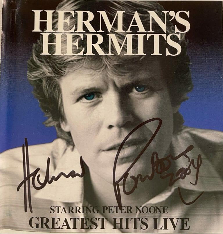 PETER NOONE HERMAN’S HERMITS SIGNED AUTOGRAPH CD COVER “GREATEST HITS LIVE” MRA COLLECTIBLE MEMORABILIA
