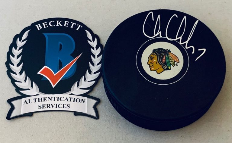 CHRIS CHELIOS SIGNED CHICAGO BLACKHAWKS PUCK AUTOGRAPHED HAWKS BECKETT WITNESSED COLLECTIBLE MEMORABILIA