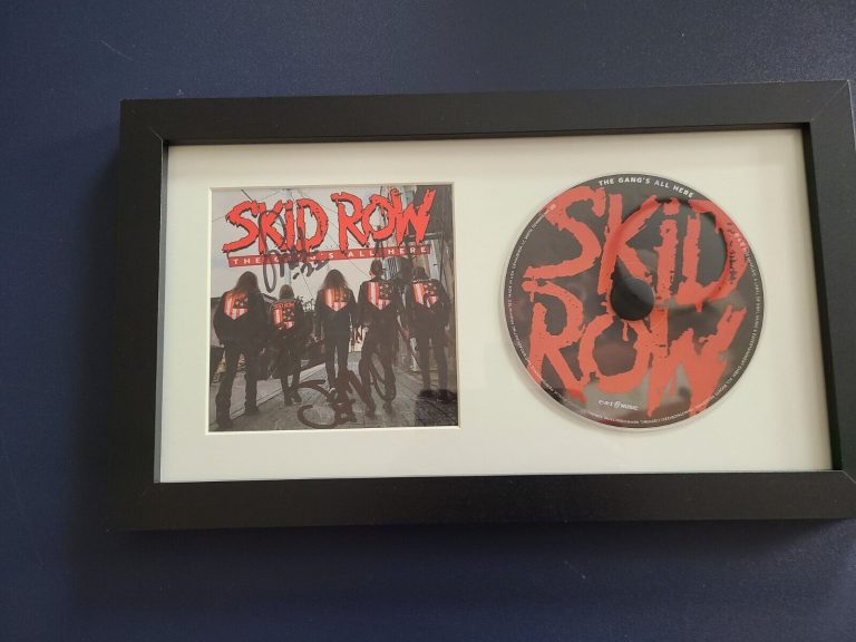 SKID ROW SIGNED THE GANG’S ALL HERE FRAMED AND MATTED CD INSERT BOOKLET COLLECTIBLE MEMORABILIA