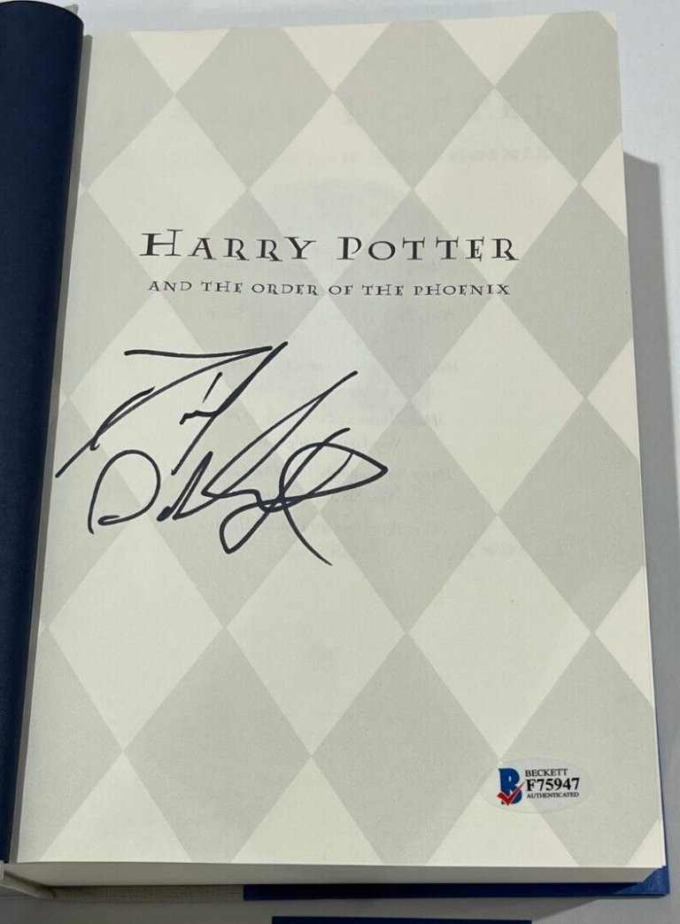 DANIEL RADCLIFFE SIGNED HARRY POTTER AND THE ORDER OF THE PHOENIX BOOK BECKETT B COLLECTIBLE MEMORABILIA