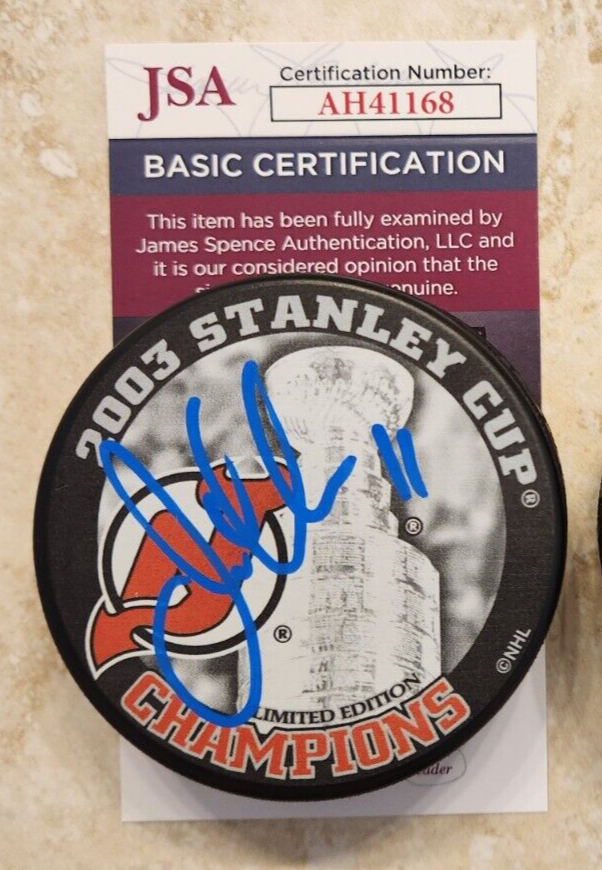 JOHN MADDEN SIGNED 2003 STANLEY CUP CHAMPIONS PUCK W/ JSA COA #AH41168 NJ DEVILS COLLECTIBLE MEMORABILIA