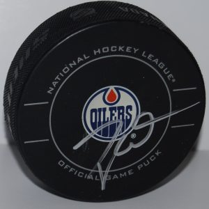 TAYLOR HALL signed (EDMONTON OILERS) Official game hockey puck W/COA #2 Collectible Memorabilia
