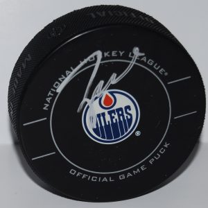 TAYLOR HALL signed (EDMONTON OILERS) Official game hockey puck W/COA #4 Collectible Memorabilia