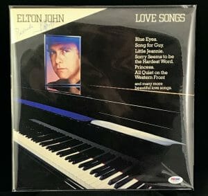 ELTON JOHN SIGNED LOVE SONGS ALBUM PSA DNA AF067272 W/ RARE FULL SIGNATURE
 COLLECTIBLE MEMORABILIA