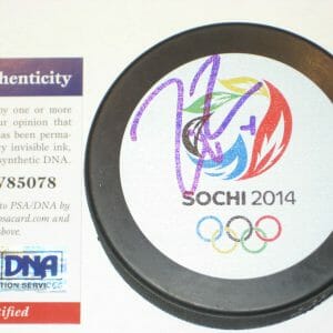 ZACH PARISE (USA) signed 2014 OLYMPIC Puck w/ PSA COA