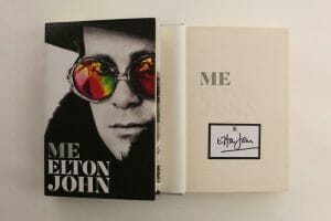 ELTON JOHN SIGNED AUTOGRAPH ME BOOK – ROCK OF THE WESTIES CARIBOU, HONKY CHATEAU
 COLLECTIBLE MEMORABILIA