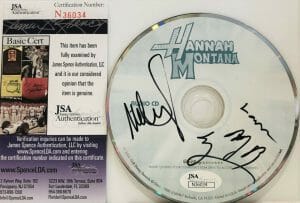 MILEY CYRUS BILLY RAY CYRUS SIGNED AUTOGRAPH “HANNAH MONTANA” CD INSERT JSA COA
 COLLECTIBLE MEMORABILIA