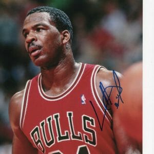 CHICAGO BULLS CHARLES OAKLEY RED JERSEY SIGNED 8X10
