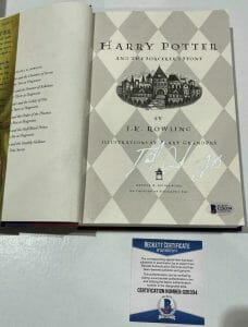 DANIEL RADCLIFFE SIGNED HARRY POTTER AND THE SORCERER’S STONE BOOK BECKETT 174 COLLECTIBLE MEMORABILIA