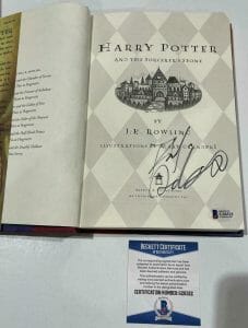 DANIEL RADCLIFFE SIGNED HARRY POTTER AND THE SORCERER’S STONE BOOK BECKETT 179 COLLECTIBLE MEMORABILIA
