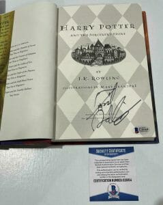 DANIEL RADCLIFFE SIGNED HARRY POTTER AND THE SORCERER’S STONE BOOK BECKETT 160 COLLECTIBLE MEMORABILIA