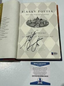 DANIEL RADCLIFFE SIGNED HARRY POTTER AND THE SORCERER’S STONE BOOK BECKETT 155 COLLECTIBLE MEMORABILIA