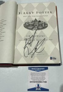 DANIEL RADCLIFFE SIGNED HARRY POTTER AND THE SORCERER’S STONE BOOK BECKETT 122 COLLECTIBLE MEMORABILIA