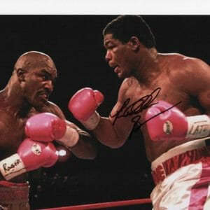 BOXER RIDDICK BOWE PINK GLOVES SIGNED 8X10