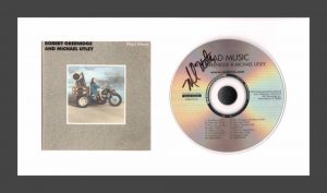 MICHAEL UTLEY SIGNED AUTOGRAPH FRAMED CD JIMMY BUFFETT CORAL REEFER BAND JSA COA
 COLLECTIBLE MEMORABILIA
