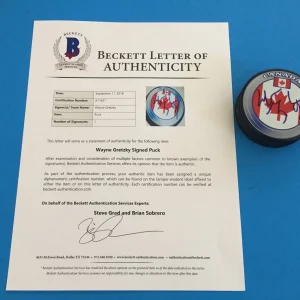 Wayne Gretzky Canada Flag Signed Puck Auto Beckett BAS LOA Letter COA