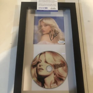 BEBE REXHA SIGNED AUTOGRAPH FRAMED CD DISPLAY ACOA BEBE IM GOOD