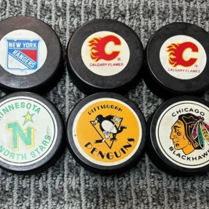 (7) NHL Vintage Hockey Puck Lot Minnesota North Stars Calgary Flames Blackhawks