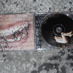 ALANIS MORISSETTE SIGNED SUPPOSED FORMER INFATUATION JUNKIE CD COVER