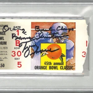 TOM OSBORNE & BARRY SWITZER SIGNED ORANGE BOWL TICKET PSA DNA 84603883