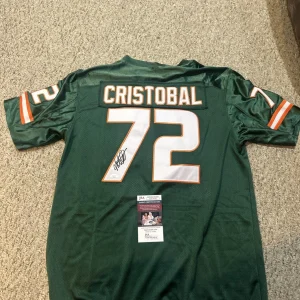 MIAMI HURRICANES- MARIO CRISTOBAL SIGNED AUTOGRAPH JERSEY JSA COA FOOTBALL COACH