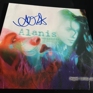 ALANIS MORISSETTE SIGNED AUTOGRAPH VINYL JAGGED LITTLE PILL IRONIC BECKETT BAS C