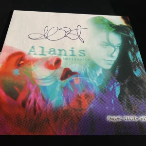 ALANIS MORISSETTE SIGNED AUTOGRAPH VINYL JAGGED LITTLE PILL IRONIC BECKETT BAS H